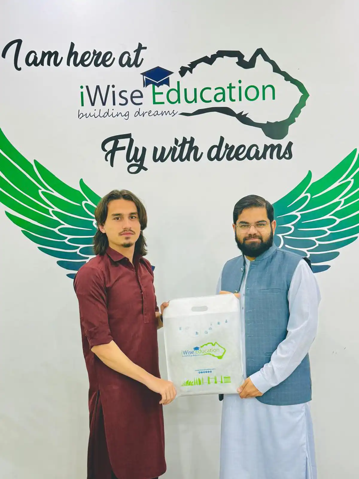 Dr Hammad Naeem as Managing Partner iWise Education appreciating students